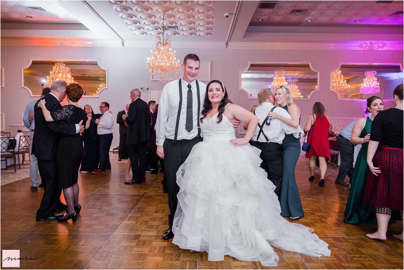Oakbrook wedding in Drury Lane ,Venue, Reception Hall, Bride and Groom, guests family and friends dancing dance floor party dj