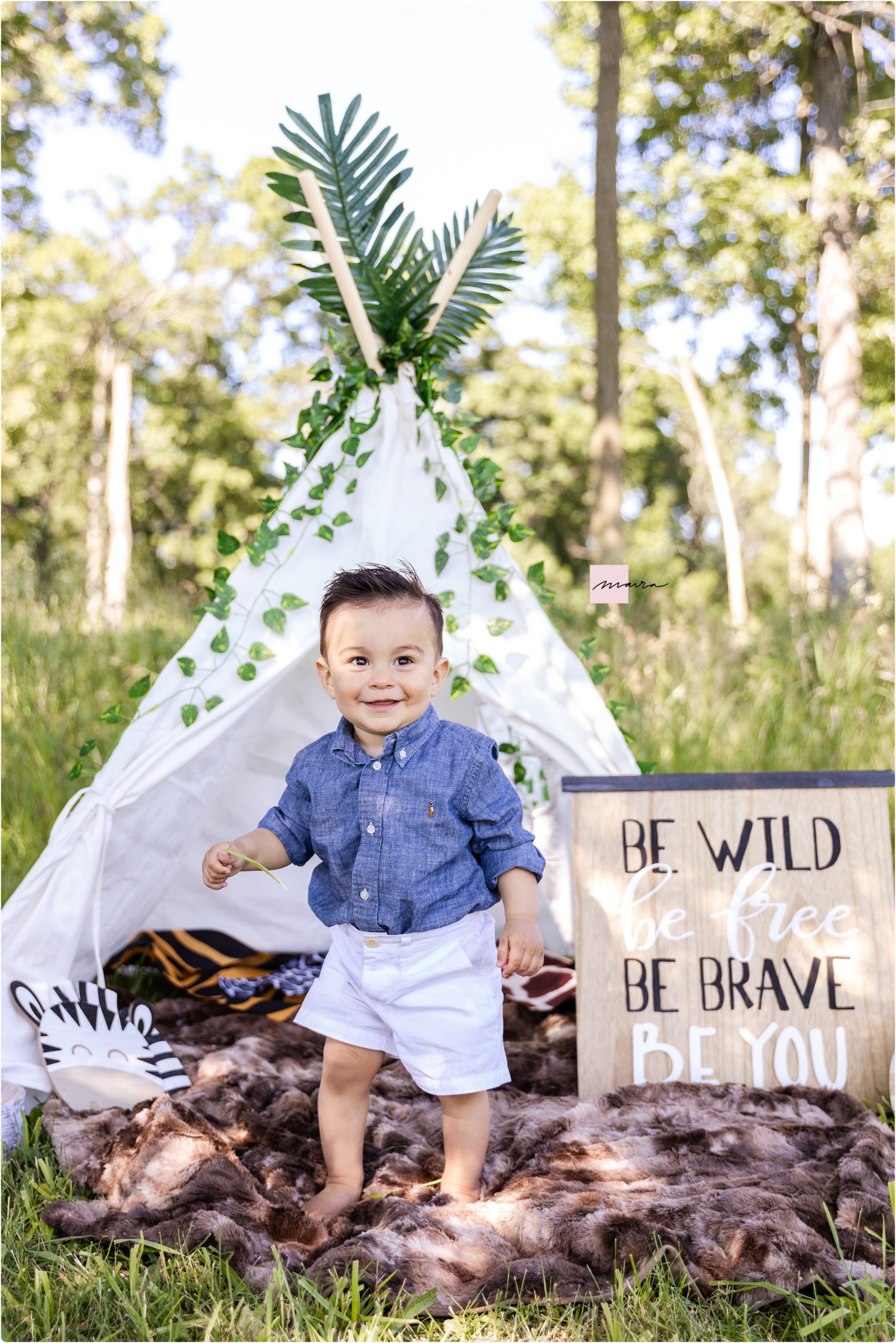 1st Birthday smash the cake under a cute tent , Where the wild things are theme, One props outdoor session, green trees and fields, Be wild be free be brave be you, fun beautiful family, grandparents photo session, mom and dad, brothers, kids photo, birthday cake, cute family, grandma and grandpa with grandchildren, loving family, beautiful family